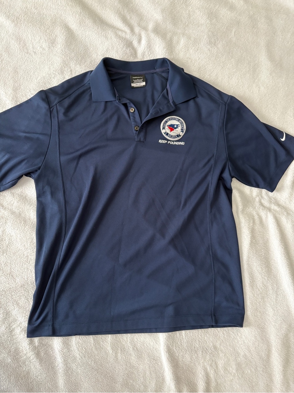 Nike Men’s Navy Blue Polo with Embroidered Logo